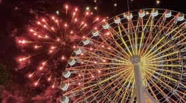 Fireworks and giant Ferris wheel illuminate sky as the Philippines celebrate festive season