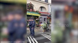 Police and emergency crews on scene after 2 killed in shooting in Paris