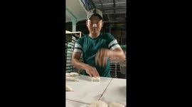Vietnamese baker stuffed with flour to make bread super fast
