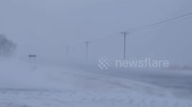 Wild winter storm intensifies into bomb cyclone, bringing blizzard conditions to Midwest
