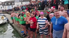 Christmas Day harbour swim in Weymouth, Dorset attracts over 400 swimmers braving the cold