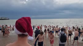 Hundreds brave cold waters on Brighton Beach for Christmas Day swim