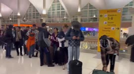 Chaos and mayhem at airports as winter storm causes flight disruptions on Christmas