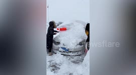 Motorists in China have to ‘dig’ their cars out after storm buries vehicles under thick layer of snow
