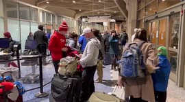 US: Long Lines Form At Airports As Winter Storm Causes Flight Disruptions On Christmas 2