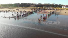 Drone footage captures people taking part in the annual South Shields Boxing Day Dip