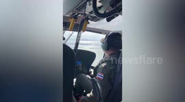 Police helicopter continues search for missing Thai sailors from sunken navy warship