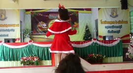 Adorable little girl, 7, shows off cute Christmas dance moves at school event in Thailand