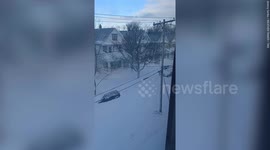 Footage shows Buffalo neighborhood buried under blanket of snow with vehicles parked almost completely covered