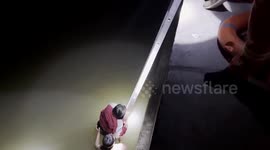 Brave student jumps into cold water to rescue drowning woman
