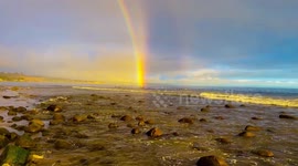 Double Rainbow at the beach during Golden Hour, California