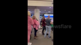 US: Long Lines Form At Airports As Winter Storm Causes Flight Disruptions On Christmas 3