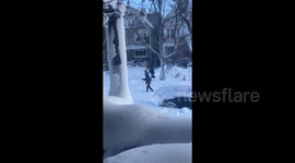 People ski streets in Buffalo as winter storm pummels New York