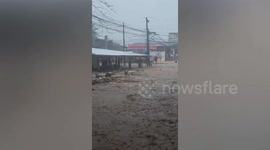 Philippines holiday floods swamp roads and kill at least 13 during Christmas festivities
