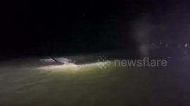 Stranded Bryde's whale helped back into sea in southern Thailand