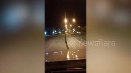 Terrifying moment python emerges on moving car's windscreen in Thailand