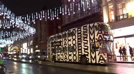 Oxford Circus Christmas Lights spectacle with Marc Jacobs London bus