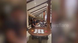 Overly-excited player loses bottle flip relay with family despite team's big lead