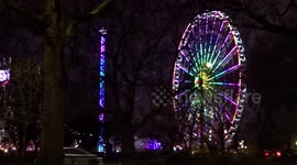 Hyde Park Winter Wonderland by night from Park Lane