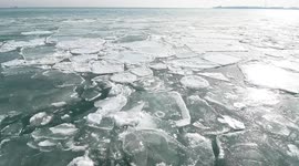 Pancake ice slams shores of Lake Michigan in Chicago