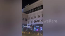 Stranded revellers climb from casino windows as fire kills at least 10 in Cambodia