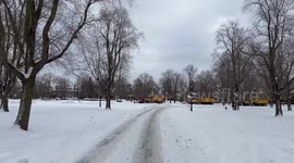 Huge queue of snow ploughs seen in Buffalo as they prepare to tackle damage caused by storm Elliot