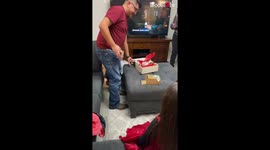 Woman surprises husband with his DREAM CAR and a PS5 for Christmas!