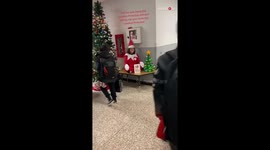 This principal dressed up as Elf on the Shelf throughout Christmas season to make school fun for students