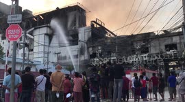 Firefighters continue to extinguish blaze that broke out at casino in Cambodia and killed 19