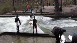 Surfing the Eisbach River in Munich! Amazing this guys in this waters!