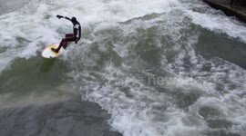 Surfing the Eisbach River in Munich! Amazing this guys in this waters!