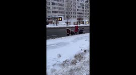 Russian Santa rides sleigh with letter Z painted on back of Christmas vehicle