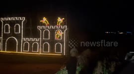 A group of people used tank as sleds and dressed as Santa.