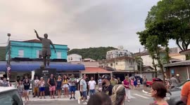 Fans gather outside Vila Belmiro Stadium, Brazil, after Pelé’s death announced