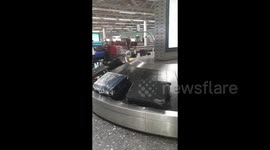 Baggage piled up at London's Heathrow Airport as Border Force workers go on strike