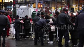 New Year’s Eve revelers arrive at security checkpoint in Times Square