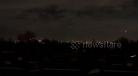 East London skyline lit by fireworks at midnight on New Year’s Eve