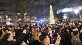 New Year's reaction at Trafalgar Square, London.