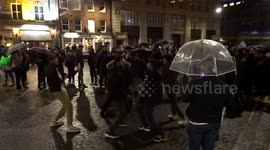 Crowds dancing in the streets as they head home after the New Year fireworks