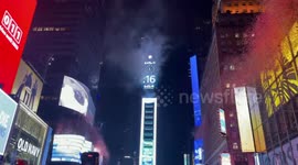Times Square: New Year’s Eve ball drops and confetti falls over crowd of revelers