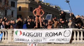 Daredevil diver plunges for the 35th time into Rome's river Tiber on traditional 1st of January dip