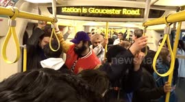 Train on the London tube full of revellers after the New Year Fireworks 2023