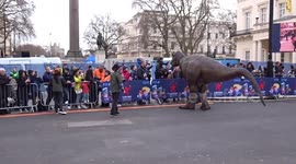 T-rex entertains the crowds awaiting London New Year Day Parade 2023