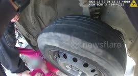Shocking footage shows trapped 65-year-old cyclist being rescued from beneath stolen car