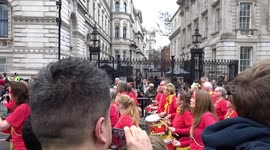 LNYDP 2023 - vintage Dawson & Co and Bloco Fogo Samba Band entertain crowds outside 10 Downing Street