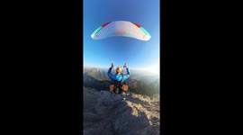 Magnificent POV of paraglider's journey through Italy