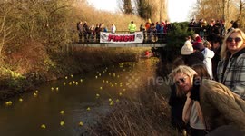 New Year's Day duck race proceeds one day late due to high river levels in Nottinghamshire, UK