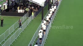 24-hour wake for legend Pele, lying in state in Santos' stadium, Brazil
