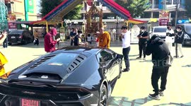 Superstitious driver has his LAMBORGHINI blessed for good luck by Buddhist monks