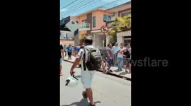 Brazil: Thousands Of Fans Line Up To Say Good Bye To Pelé At Vila Belmiro Stadium 2